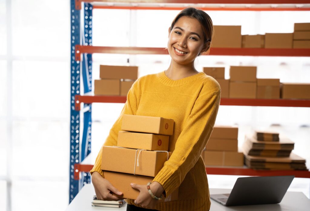 Business Women Prepare Box to Delivery